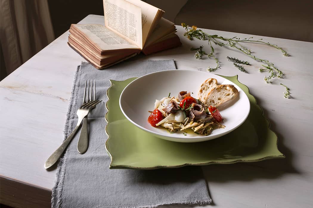 ricetta insalata con carciofi acciughe pomodori